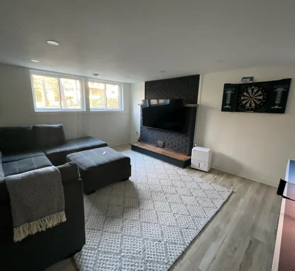 Spacious bedroom with seating area at CARI private resort for retreats and celebrations