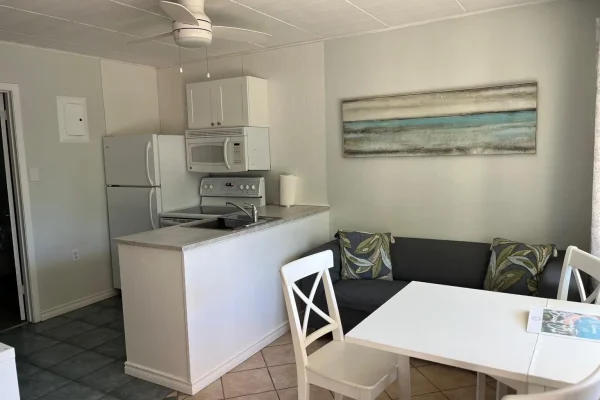 Compact open-concept kitchen and dining area in CARI private resort accommodations for retreats and celebrations